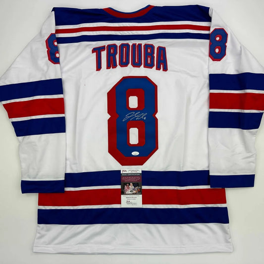 Autographed White Hockey Jersey with TROUBA 8, blue and red stripes, for professional sports fans