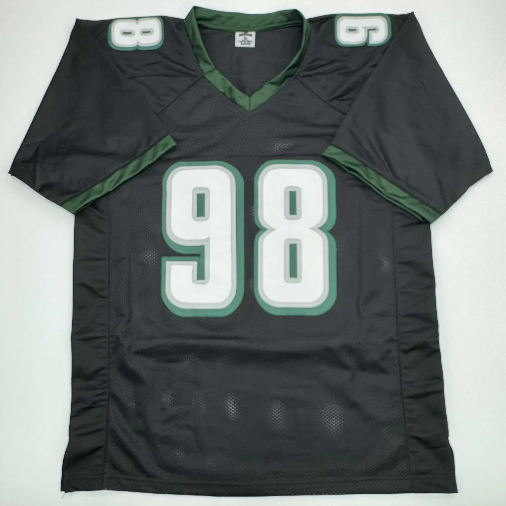 Black and green custom jersey with number 98 from professional sports league collectible