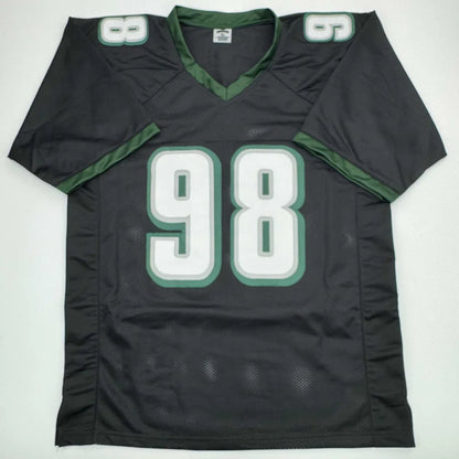 Black and green custom jersey with number 98 from professional sports league collectible