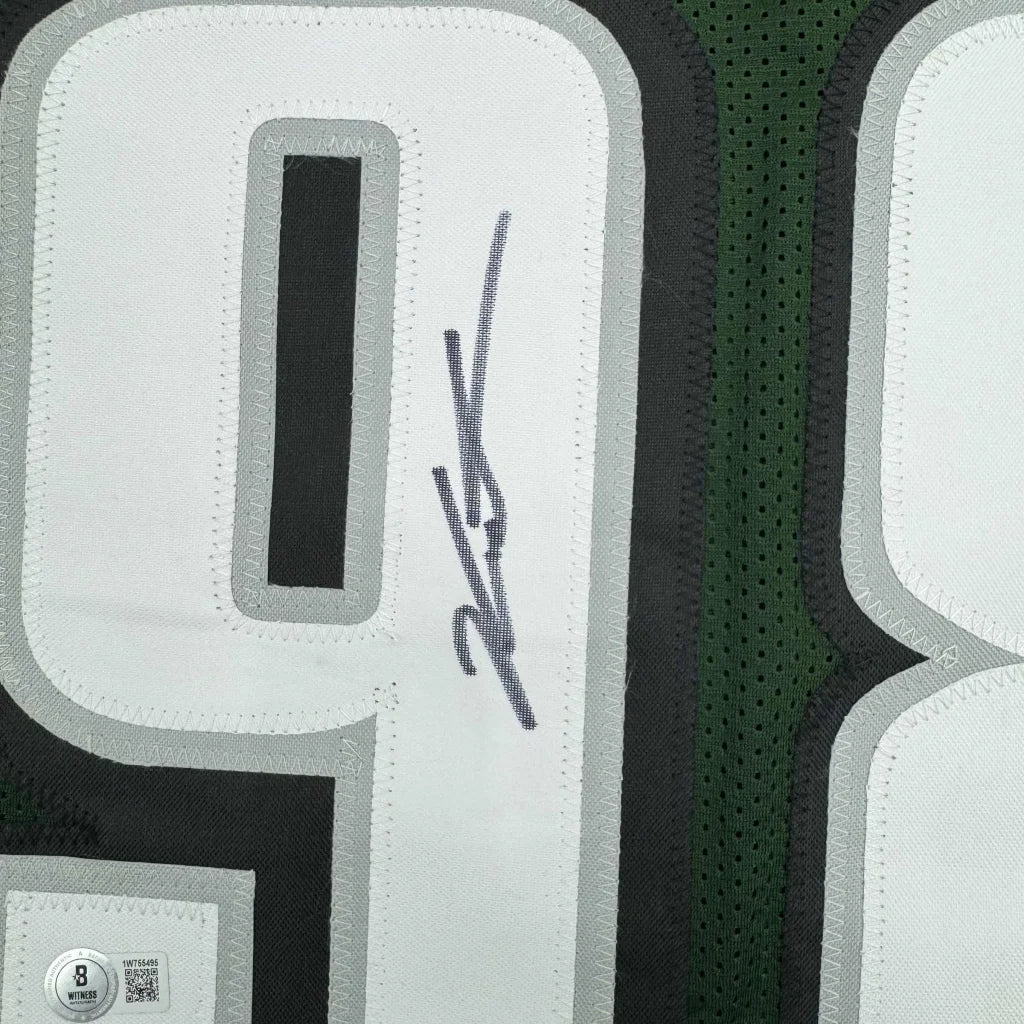 Autographed white and green custom jersey with number 09 from Carter 98 professional sports league