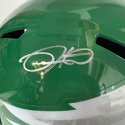 Emerald green football helmet with white stripe and third party authentication