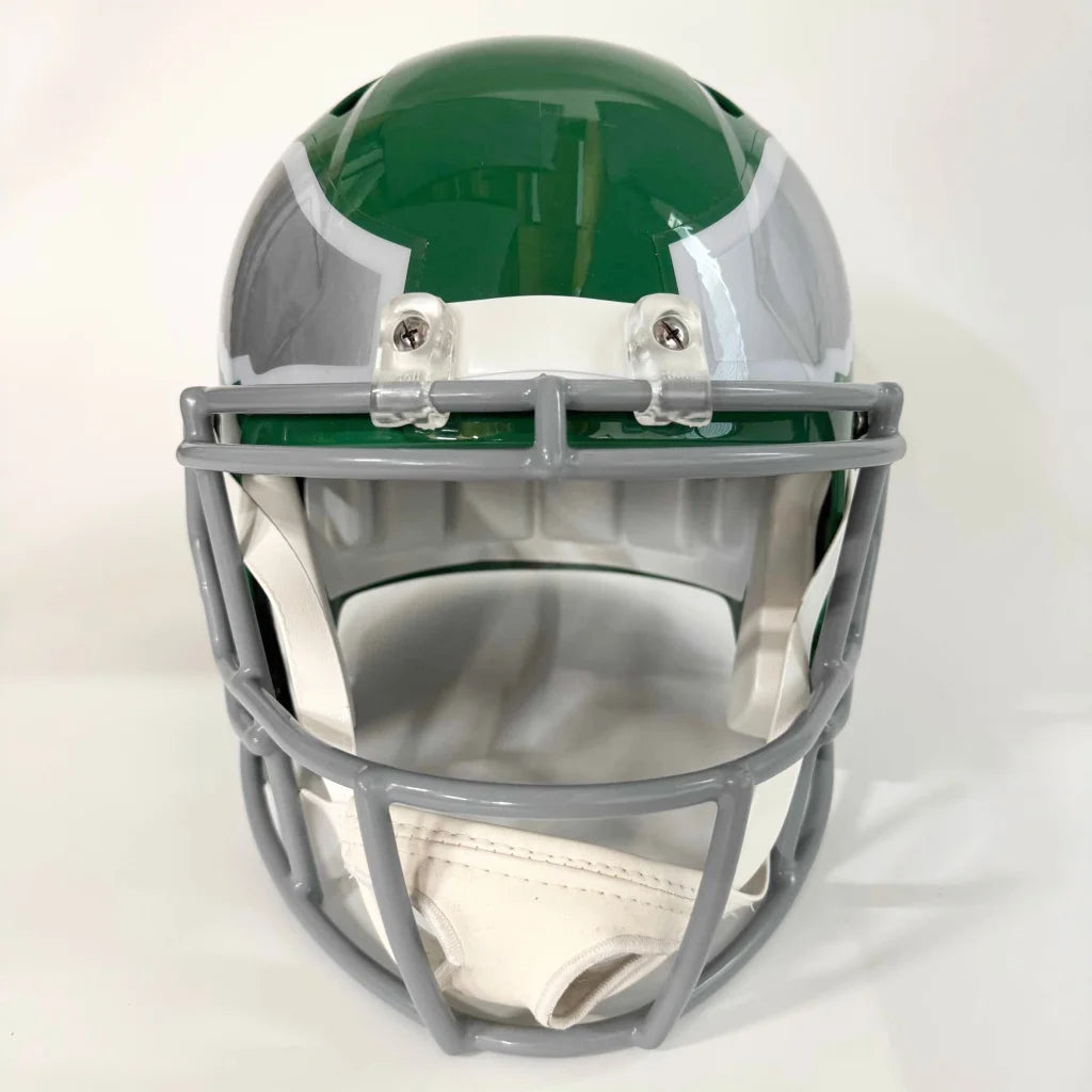 Green and silver football helmet with grey facemask, third party authentication included