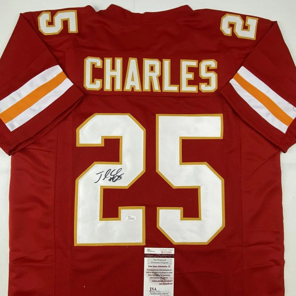 Back side of a custom kansas city professional sports league red football jersey with white and gold lettering charles 25 autographed