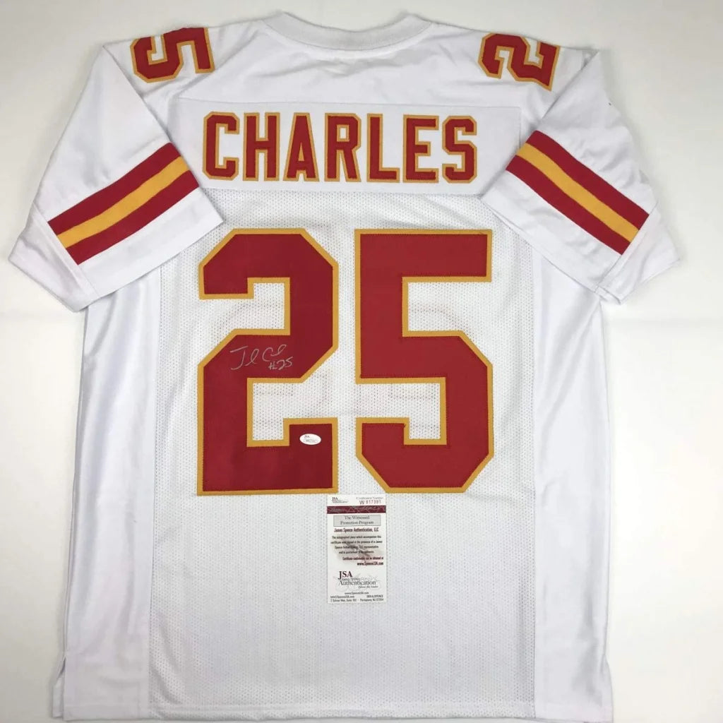 Back view of autographed jamaal charles kansas city chiefs white custom jersey with red and gold lettering number 25 professional sports league
