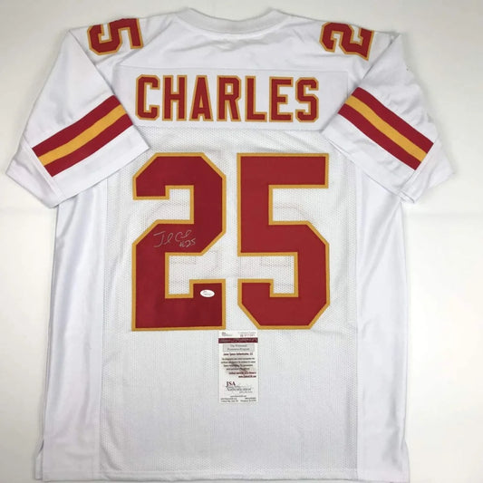 Back view of autographed jamaal charles kansas city chiefs white custom jersey with red and gold lettering number 25 professional sports league