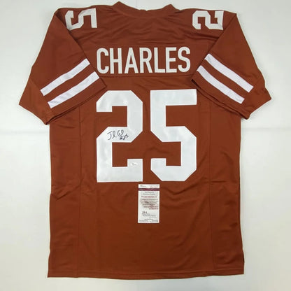 Back of a maroon texas longhorns custom jersey with white lettering autographed by jamaal charles number 25 professional sports league