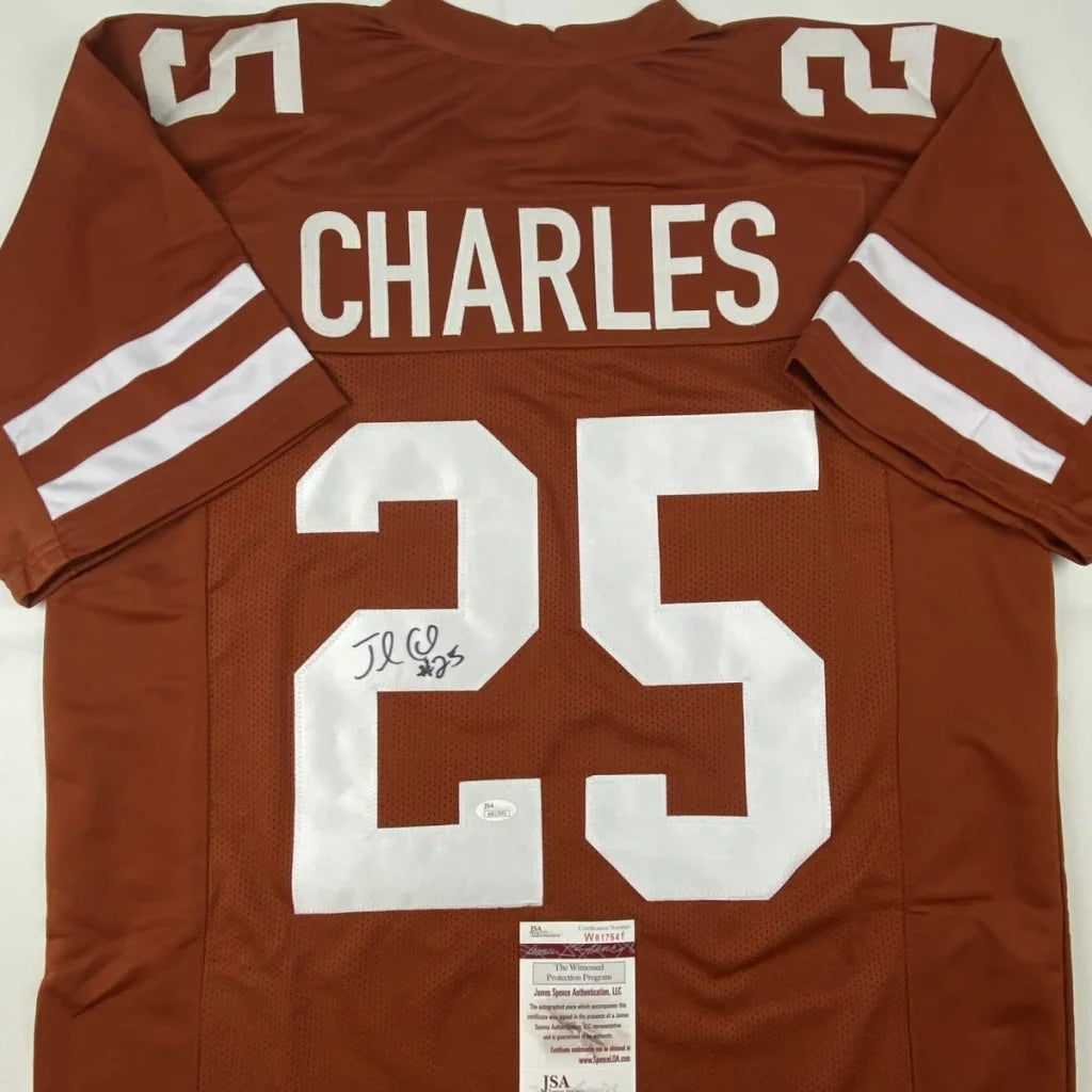 Back of a maroon custom texas longhorns football jersey with white lettering number 25 and name charles signed by jamaal charles