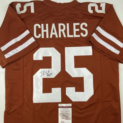 Back of a maroon custom texas longhorns football jersey with white lettering number 25 and name charles signed by jamaal charles