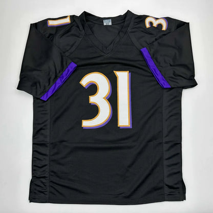 Black custom jersey with purple white and gold numbers from J Lewis 31 professional sports league