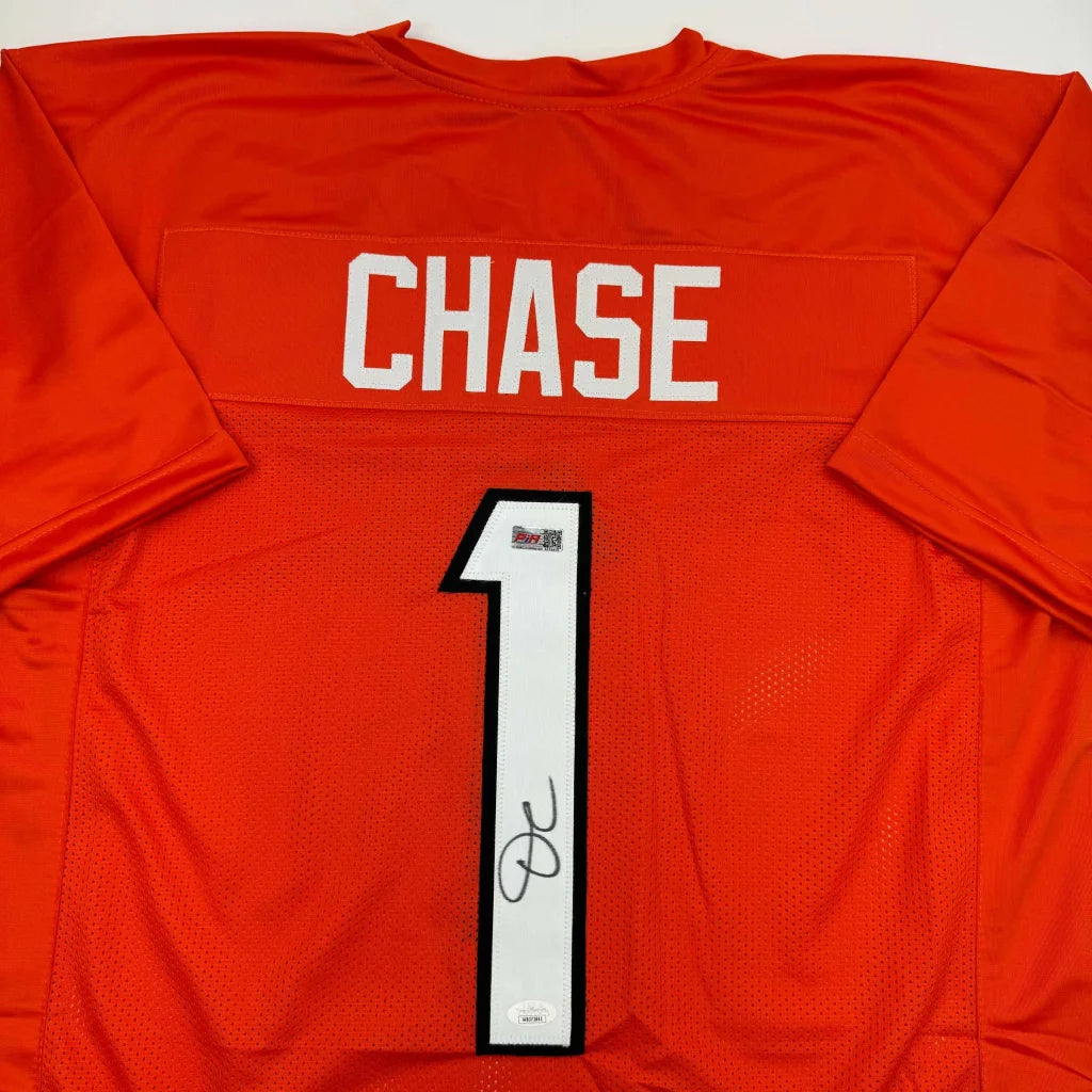 Autographed Ja’Marr Chase custom orange Bengals jersey with number 1