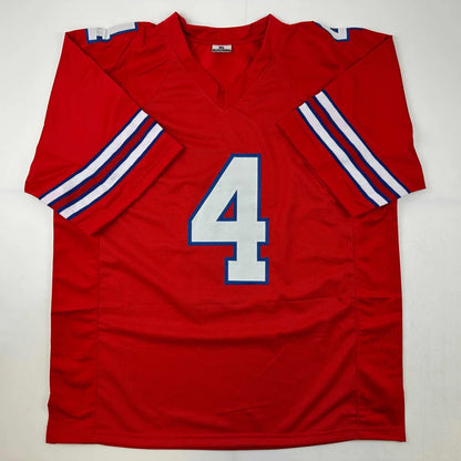 Red custom jersey signed by James Cook, sports league star, with white 4 and blue sleeve stripe