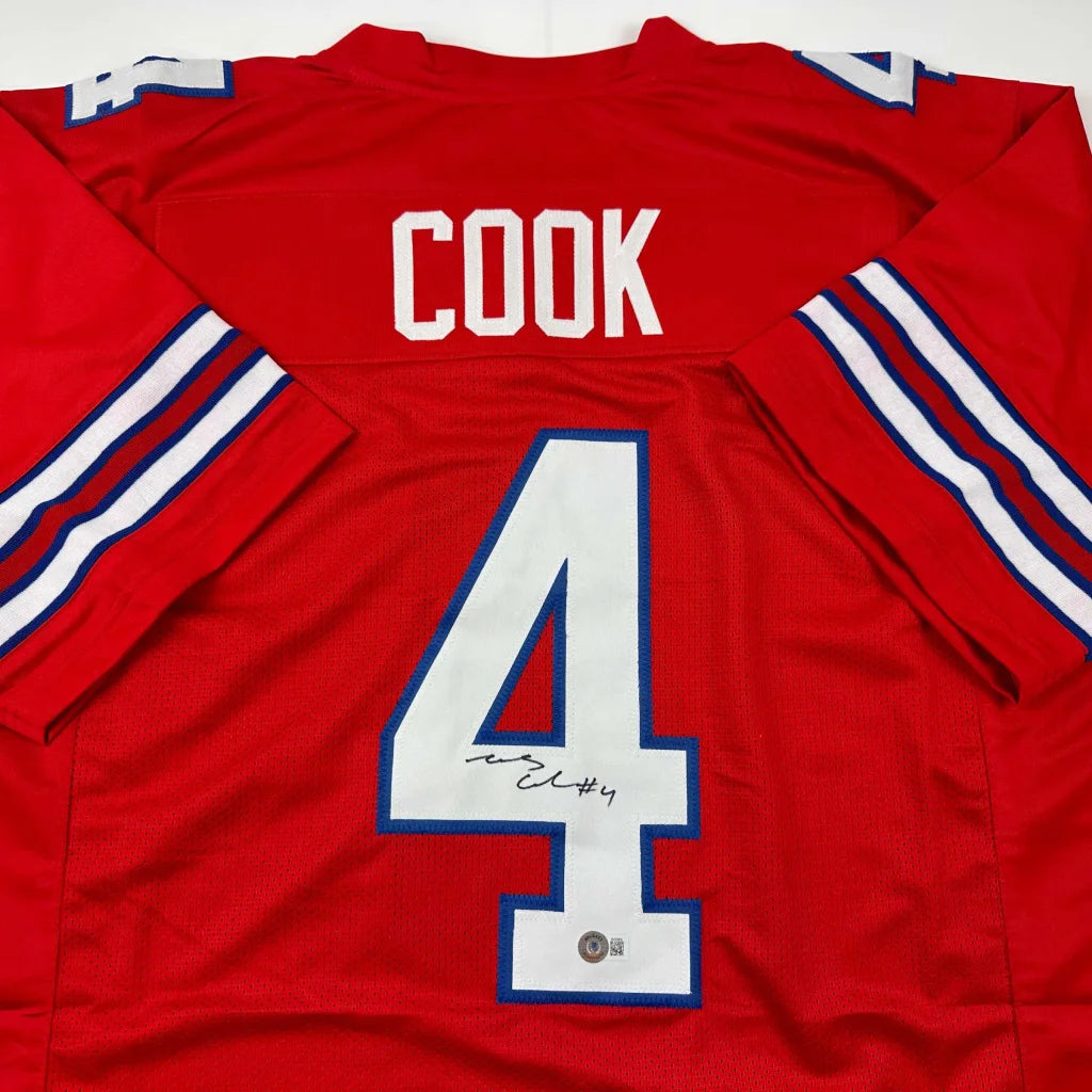 Autographed red custom jersey by James Cook, sports league star
