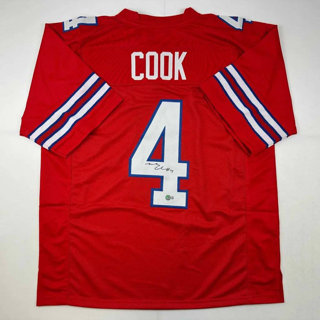 Red custom jersey signed by James Cook, sports league star with Cook name