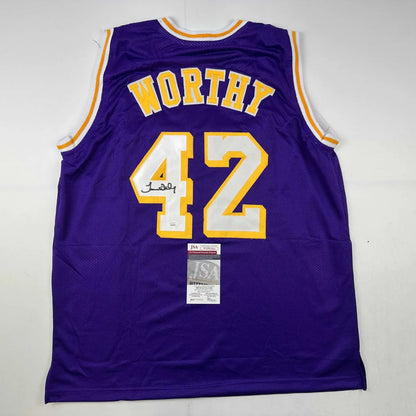 Autographed purple and gold Lakers jersey from professional sports league collectible