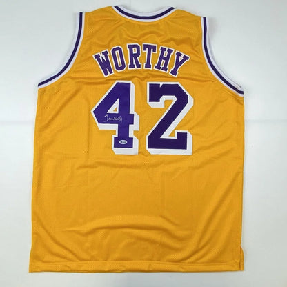 Autographed James Worthy Los Angeles LA Yellow Basketball Jersey Beckett BAS COA | Hall of Fame Sports Memorabilia | vintageantiquesgifts.com