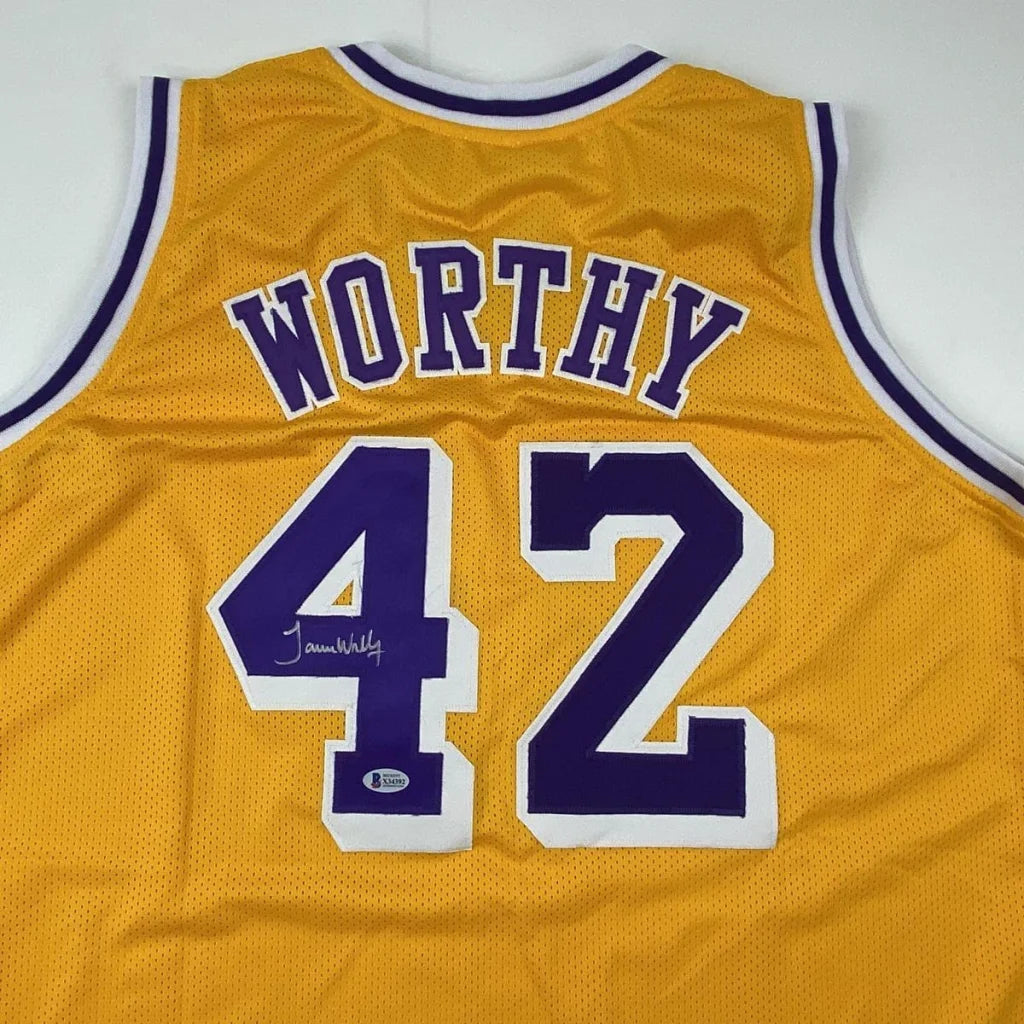Autographed James Worthy Los Angeles LA Yellow Basketball Jersey Beckett BAS COA | Certified Authentic Signed Memorabilia | vintageantiquesgifts.com