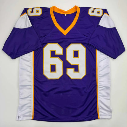 Autographed jared allen minnesota custom football jersey in purple white with gold trim number 69 from a professional sports league