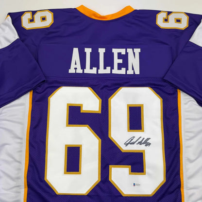 Back side of autographed jared allen minnesota vikings custom jersey in purple white with gold trim professional sports league