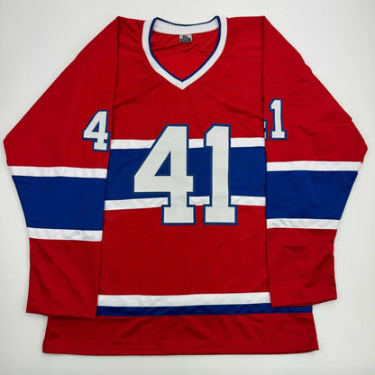 Red long-sleeved hockey jersey with blue and white stripes and number 41 for professional sports league