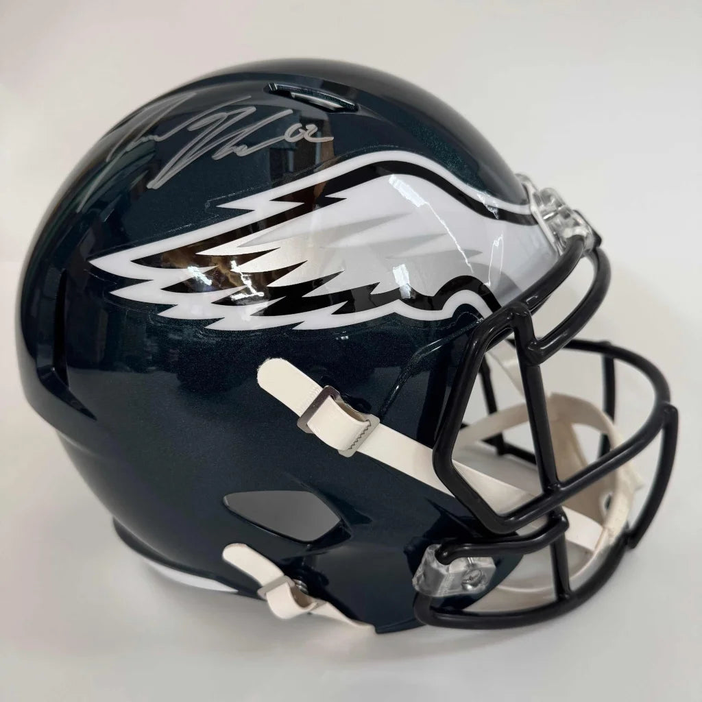 Dark green Philadelphia Eagles helmet with Jason Kelce logo and third party verified badge