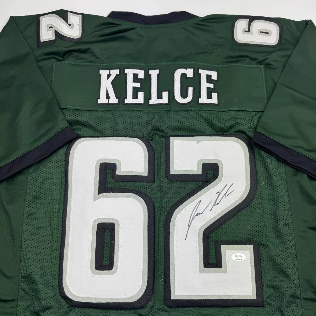 Green custom football jersey with kelce 62 name number signed by player from a professional sports league