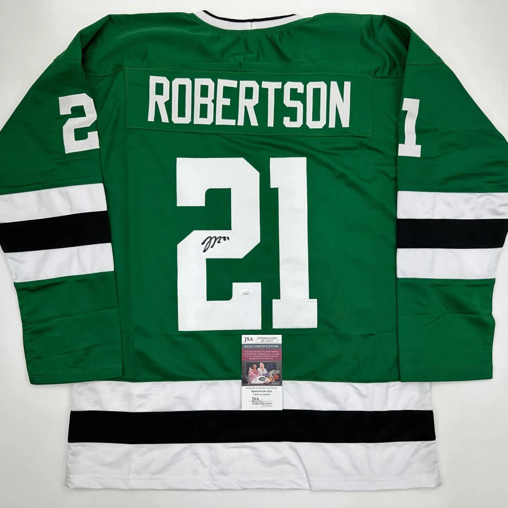 Green professional sports league hockey jersey with autograph and authentication sticker