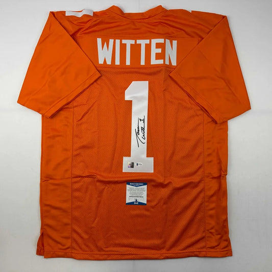 Back of an autographed jason witten tennessee orange college football custom jersey with white lettering and number