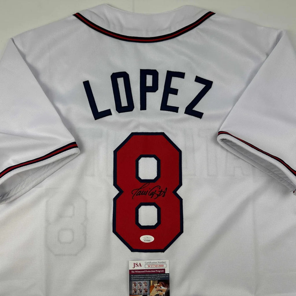 White custom jersey with LOPEZ 8 signature, authentic pro sports league collectible