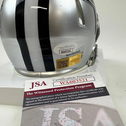 Silver Dallas Cowboys mini helmet with black and white stripes, JSA authentication stickers and certificate
