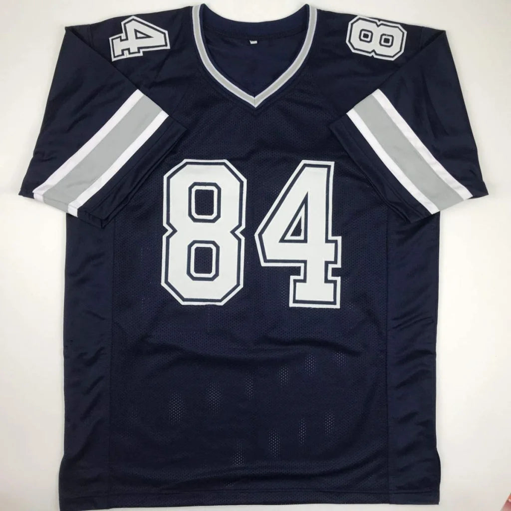 Navy blue professional sports custom jersey with white trim and number 84