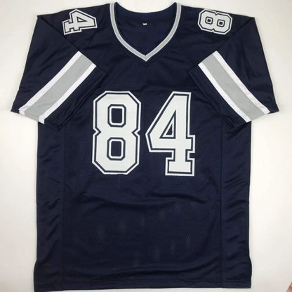 Navy blue professional sports custom jersey with white trim and number 84