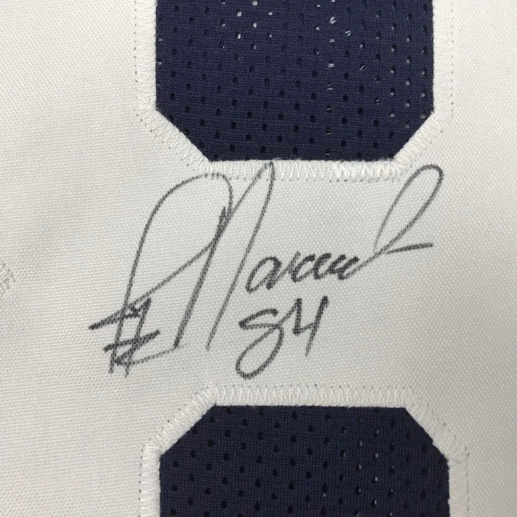 Autographed Dallas Cowboys custom jersey from professional sports league featuring Novacek