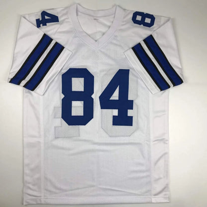 White football jersey with blue number 84 and arm stripes from Custom Jersey Dallas Cowboys 84 Novacek for professional sports league fans
