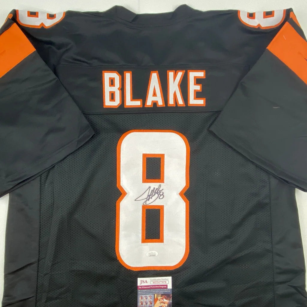 Black and orange custom jersey with number 8 and signature for professional sports fans