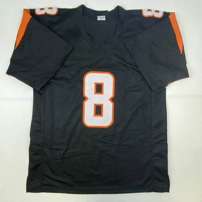 Black and orange custom jersey with number 8 from professional sports league collectible