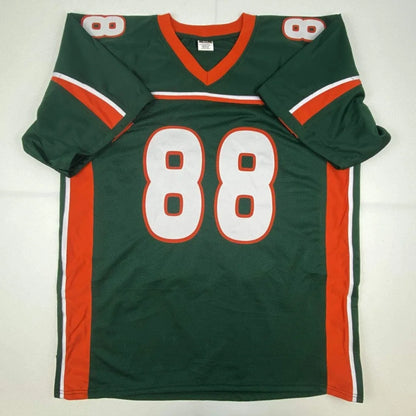 Autographed green and orange Miami Hurricanes custom jersey with white number 88 from professional sports league