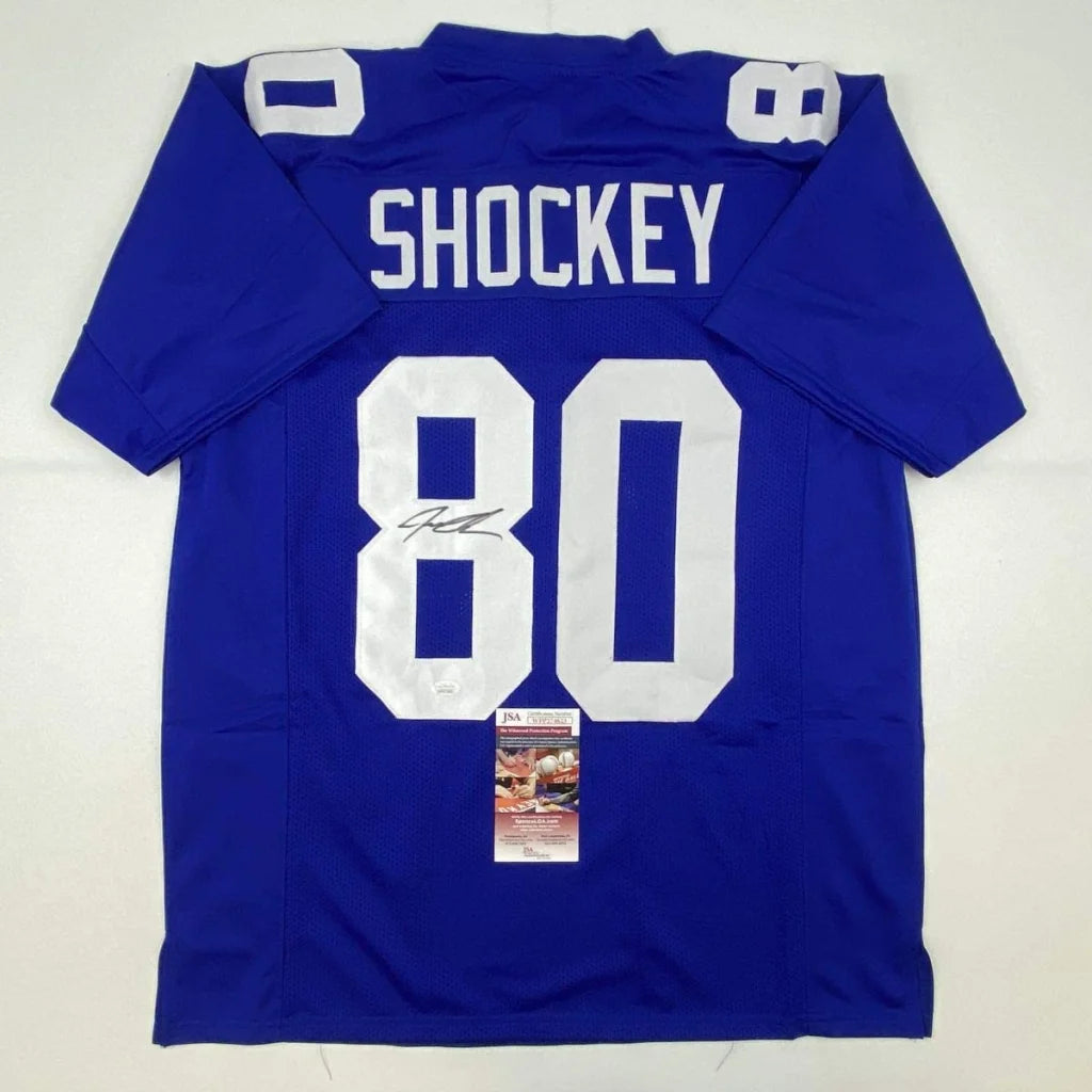 Royal blue autographed jeremy shockey football custom jersey with white lettering and number 80 from a professional sports league