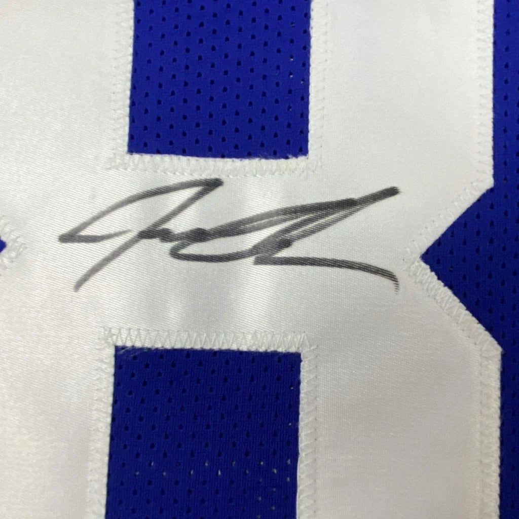 Autographed blue and white mesh custom jersey signed by jeremy shockey from a professional sports league with jsa coa