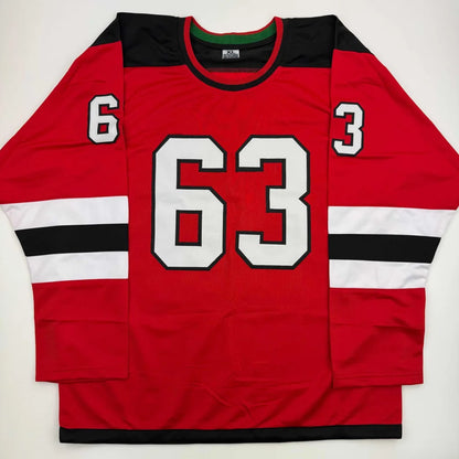 Red hockey jersey with black and white accents from Authentic Bratt 63 custom jersey for professional sports league