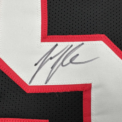 Autographed Jessie Tuggle Atlanta Black Football Jersey JSA COA | Authenticated Signed Sports Jersey | vintageantiquesgifts.com