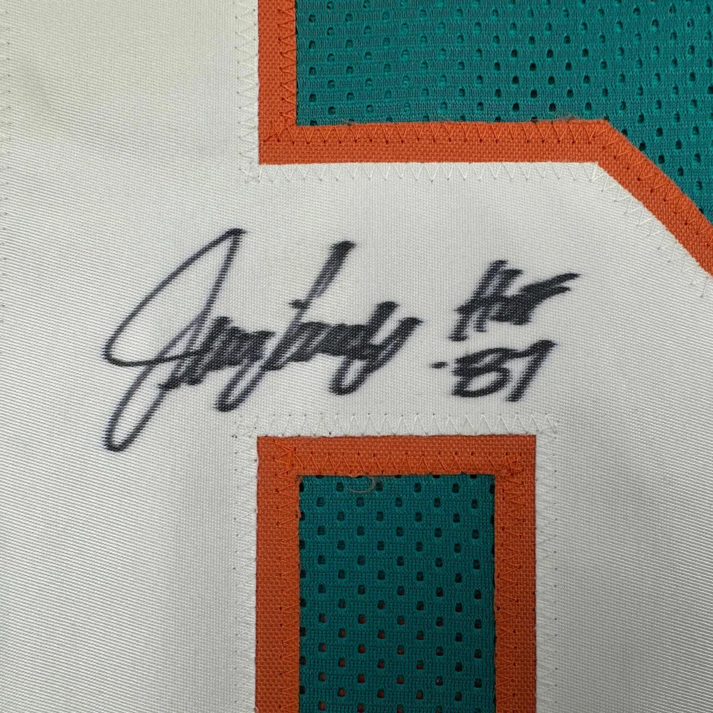 Autographed Miami Dolphins football jersey from professional sports league, perfect for custom jersey fans