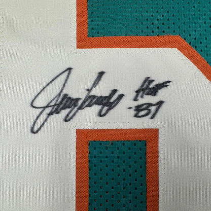 Autographed Miami Dolphins football jersey from professional sports league, perfect for custom jersey fans