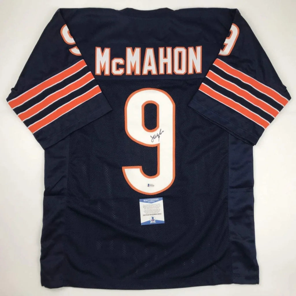 Autographed dark blue custom jersey from Professional Sports League with orange and white stripes