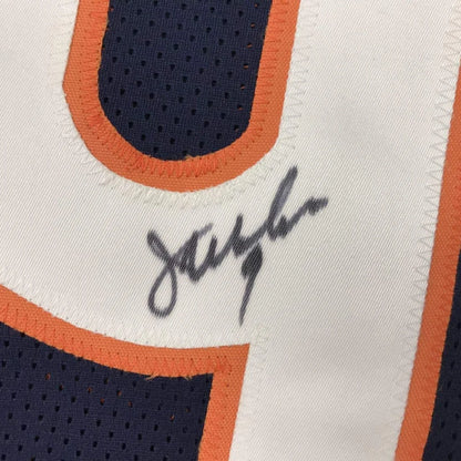 Autographed custom jersey from a professional sports league on display