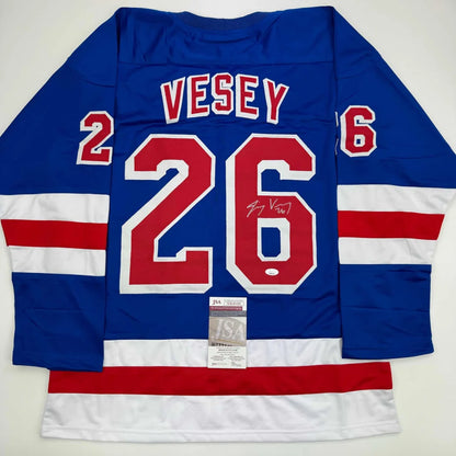 Autographed blue Vesey 26 custom jersey from a professional sports league collectible
