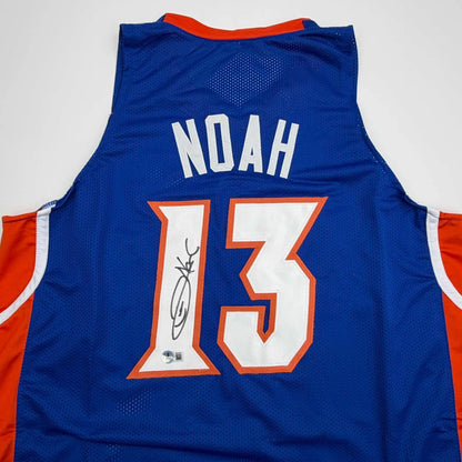 Autographed Joakim Noah Florida Blue College Basketball Jersey Beckett BAS COA | Certified Authentic Signed Memorabilia | vintageantiquesgifts.com