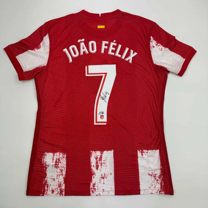 Back of autographed Joao Felix Atletico Madrid red and white striped custom jersey with number 7 for professional sports league use