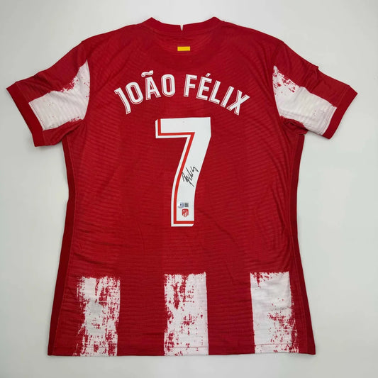 Back of autographed Joao Felix Atletico Madrid red and white striped custom jersey with number 7 for professional sports league use