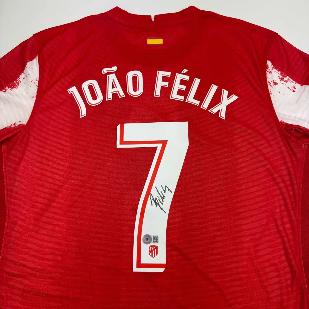 Back side of autographed joao felix atletico madrid red soccer custom jersey with white number 7 for professional sports league
