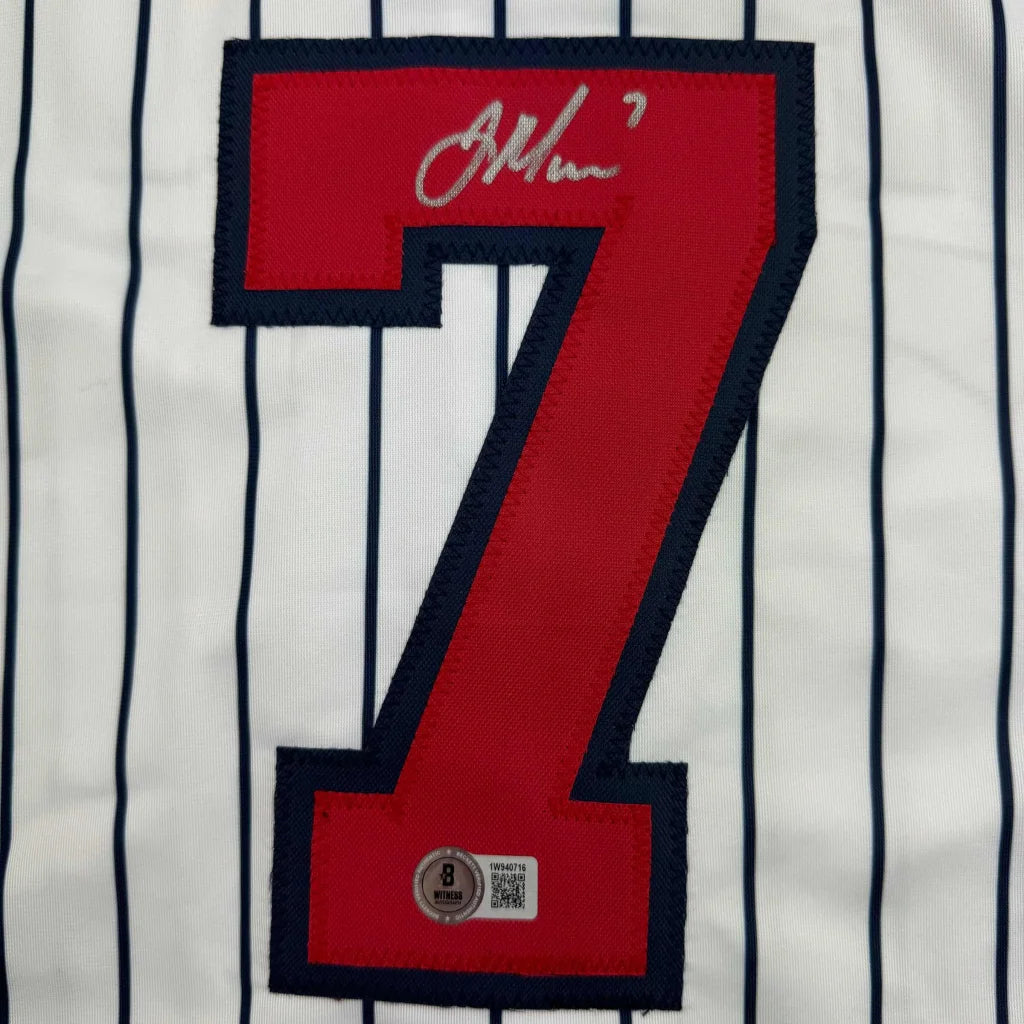 White Joe Mauer custom jersey with red blue number 7 and silver autograph from professional sports league
